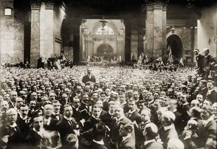 London stock brokers in a large group photo on Throgmorton Street